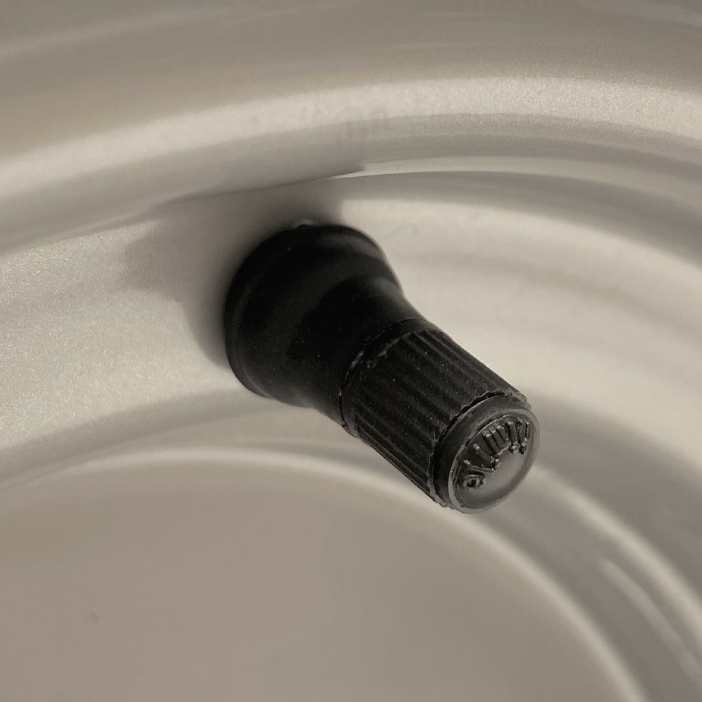 6.00x10" Wheel rim 4/100/60 ET-4 silver 750kg valve close up